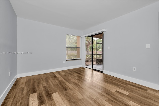 8109 SW 21st Ct Unit 8109, Miramar, FL 33025 - unfurnished room featuring wood finished floors and baseboards