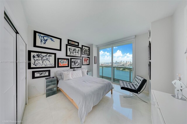 650 W Ave Unit Ph09, Miami Beach, FL 33139 - bedroom with access to outside and a water view