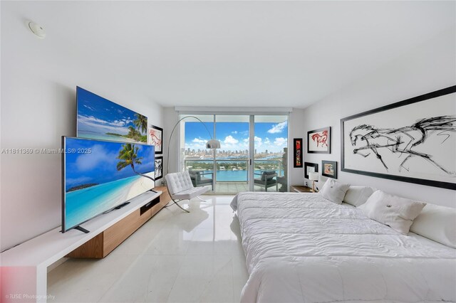 650 W Ave Unit Ph09, Miami Beach, FL 33139 - bedroom with access to outside and expansive windows