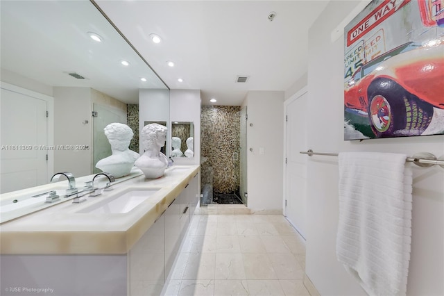 650 W Ave Unit Ph09, Miami Beach, FL 33139 - full bathroom featuring double vanity, a shower stall, and recessed lighting