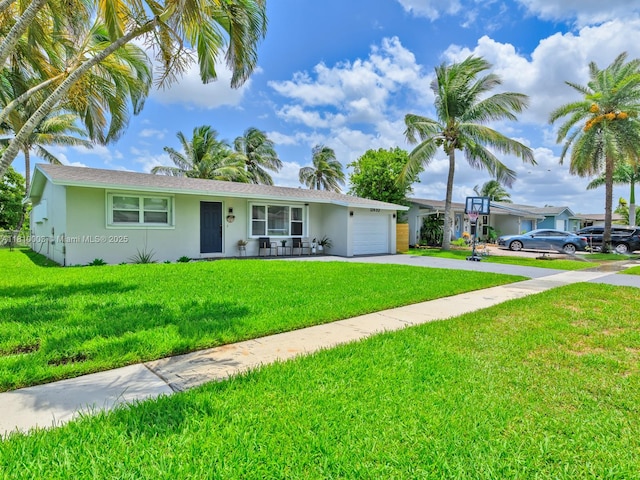 11610 NW 32nd Mnr, Sunrise, FL 33323 - ranch-style home featuring stucco siding, driveway, an attached garage, and a front lawn