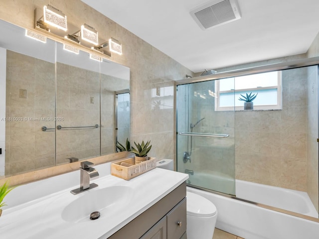 11610 NW 32nd Mnr, Sunrise, FL 33323 - bathroom with vanity, toilet, and bath / shower combo with glass door