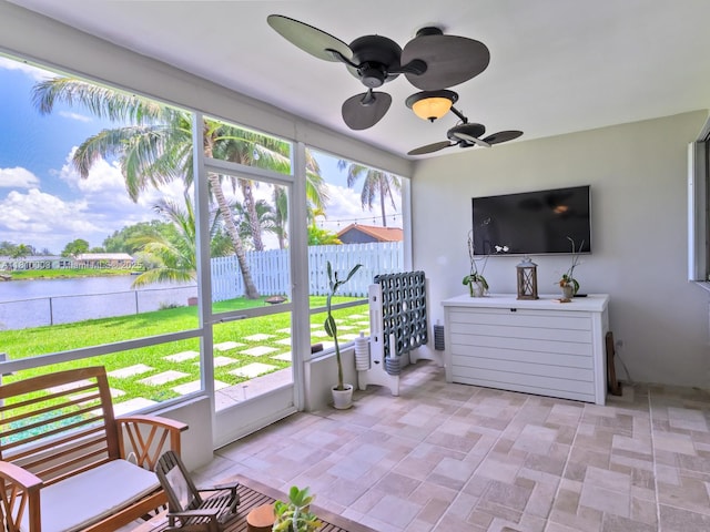 11610 NW 32nd Mnr, Sunrise, FL 33323 - sunroom with a water view and a ceiling fan