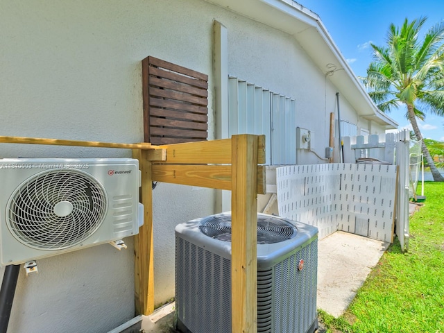 11610 NW 32nd Mnr, Sunrise, FL 33323 - exterior view of central AC unit, stucco siding, and ac unit