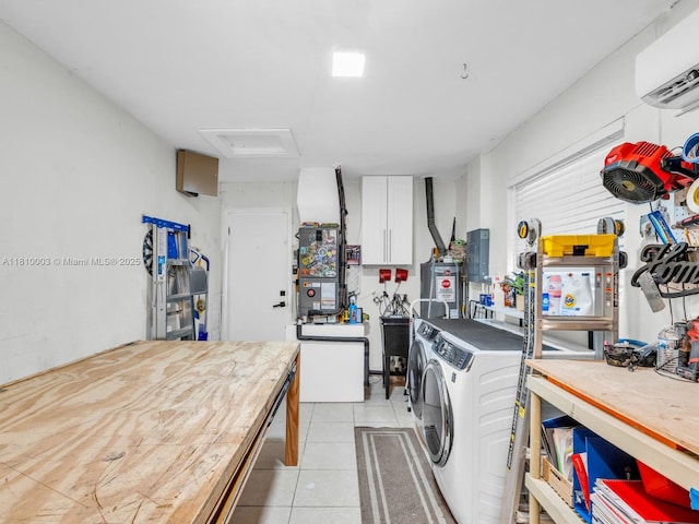 11610 NW 32nd Mnr, Sunrise, FL 33323 - kitchen featuring washer and clothes dryer, white cabinets, light tile patterned flooring, electric panel, and water heater