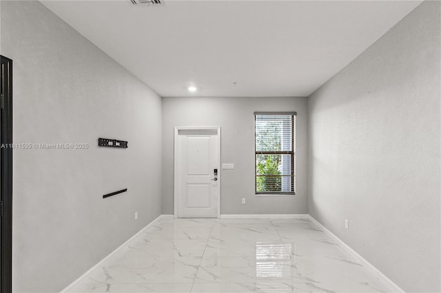 221 SW 159th Way, Pembroke Pines, FL 33027 - foyer entrance featuring light marble finish flooring, baseboards, and recessed lighting