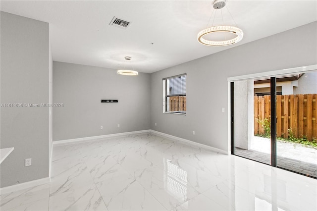 221 SW 159th Way, Pembroke Pines, FL 33027 - empty room featuring baseboards and marble look tiles