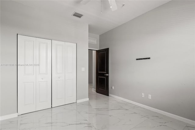 221 SW 159th Way, Pembroke Pines, FL 33027 - unfurnished bedroom with baseboards, light marble finish flooring, a closet, and a ceiling fan