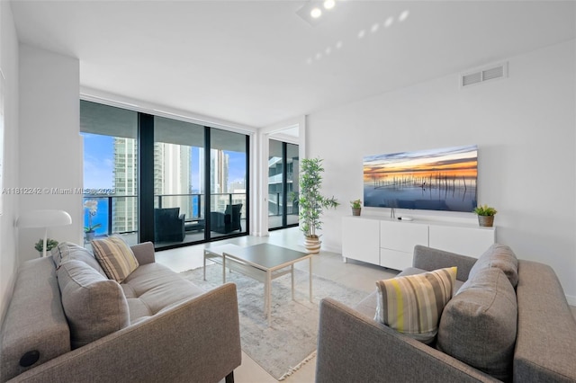 650 NE 32nd St Unit 2502, Miami, FL 33137 - living room with floor to ceiling windows and healthy amount of natural light