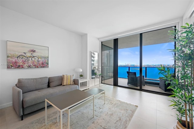 650 NE 32nd St Unit 2502, Miami, FL 33137 - living room with a wall of windows and a water view