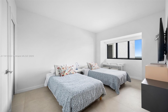 650 NE 32nd St Unit 2502, Miami, FL 33137 - bedroom featuring baseboards