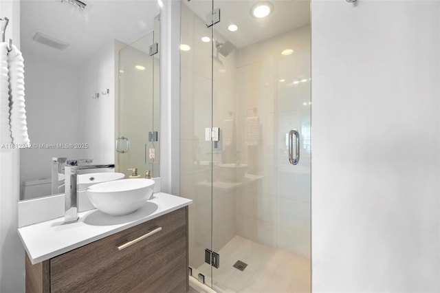 650 NE 32nd St Unit 2502, Miami, FL 33137 - bathroom featuring vanity and a stall shower
