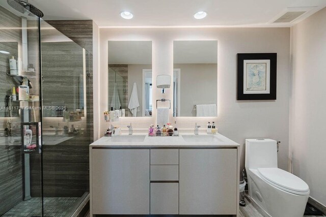 1010 Brickell Ave Unit 1501, Miami, FL 33131 - bathroom with double vanity, a stall shower, and decorative backsplash