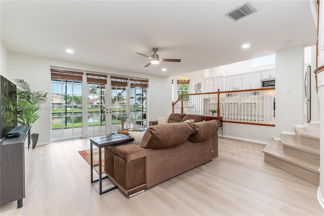 5064 SW 164th Ave, Miramar, FL 33027 - living area with stairway, light wood-style floors, ceiling fan, recessed lighting, and baseboards