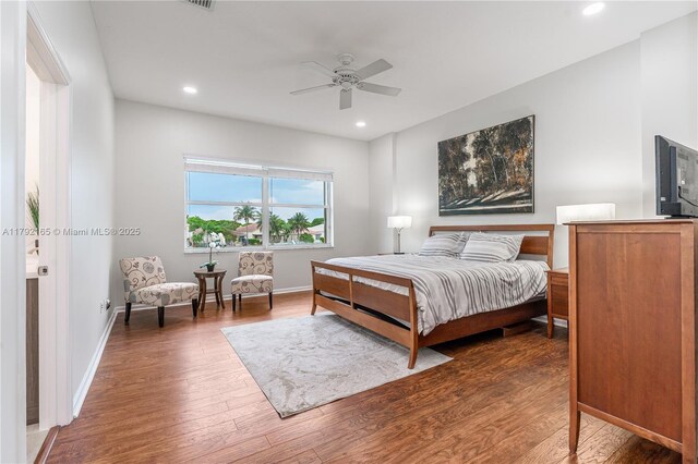 5064 SW 164th Ave, Miramar, FL 33027 - bedroom featuring wood finished floors, baseboards, recessed lighting, and a ceiling fan
