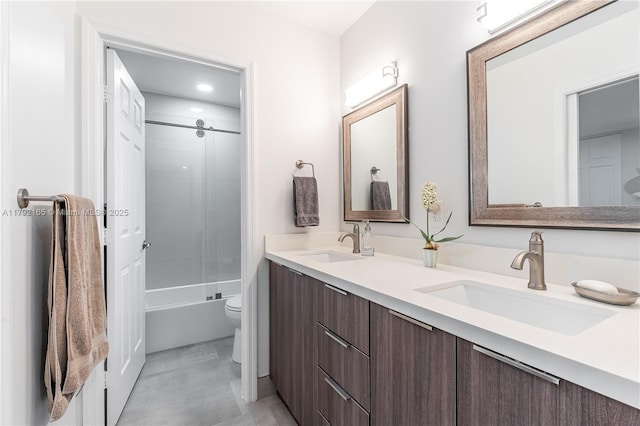 5064 SW 164th Ave, Miramar, FL 33027 - bathroom with double vanity, toilet,  shower combination, and recessed lighting