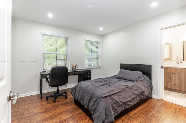 5064 SW 164th Ave, Miramar, FL 33027 - bedroom with wood finished floors, recessed lighting, a desk, and connected bathroom