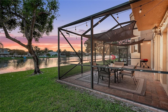 5064 SW 164th Ave, Miramar, FL 33027 - view of patio / terrace with a water view, a lanai, and a grill