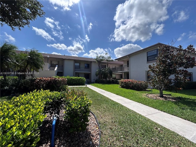 9577 W Mcnab Rd Unit 110, Tamarac, FL 33321 - view of property's community featuring a yard