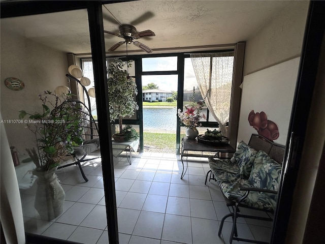 9577 W Mcnab Rd Unit 110, Tamarac, FL 33321 - sunroom / solarium featuring a water view