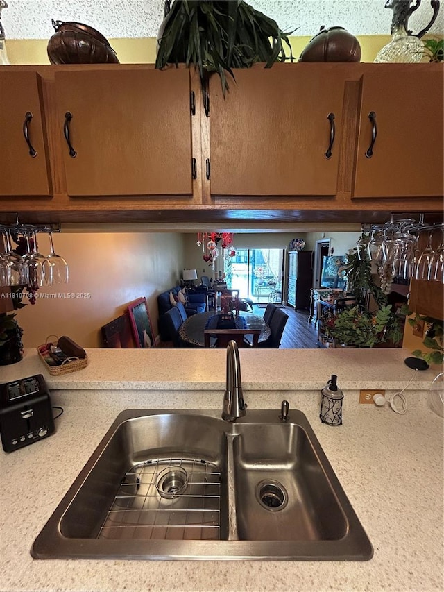 9577 W Mcnab Rd Unit 110, Tamarac, FL 33321 - kitchen featuring a sink and light countertops