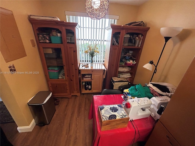 9577 W Mcnab Rd Unit 110, Tamarac, FL 33321 - bedroom with wood finished floors and electric panel