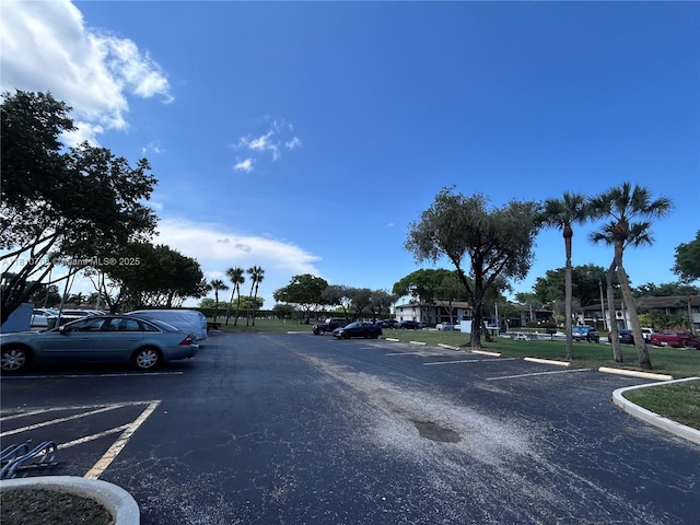 9577 W Mcnab Rd Unit 110, Tamarac, FL 33321 - view of asphalt street with curbs