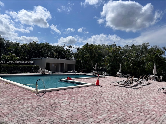 9577 W Mcnab Rd Unit 110, Tamarac, FL 33321 - community pool featuring a patio area
