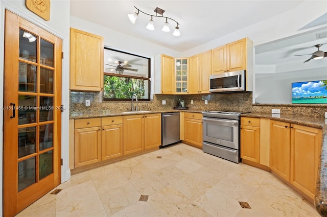 8205 SW 171st Ter, Palmetto Bay, FL 33157 - kitchen with stainless steel appliances, a ceiling fan, and tasteful backsplash