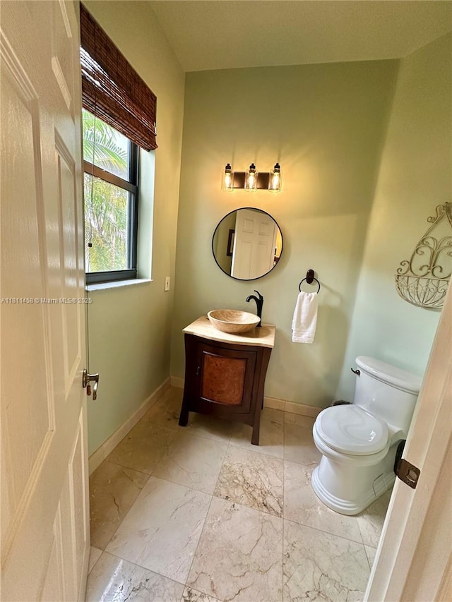8205 SW 171st Ter, Palmetto Bay, FL 33157 - half bathroom featuring vanity and marble finish floors