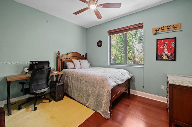 8205 SW 171st Ter, Palmetto Bay, FL 33157 - bedroom featuring wood finished floors, a desk, and a ceiling fan