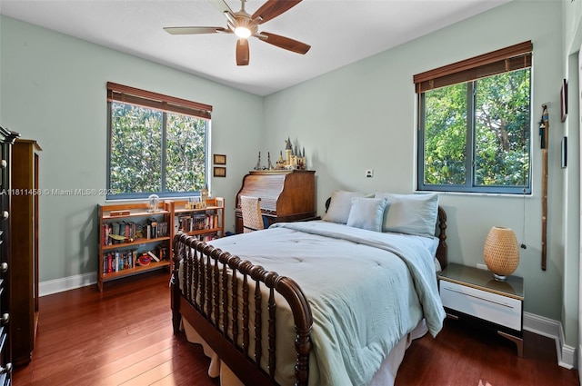 8205 SW 171st Ter, Palmetto Bay, FL 33157 - bedroom featuring multiple windows, hardwood / wood-style flooring, and a ceiling fan