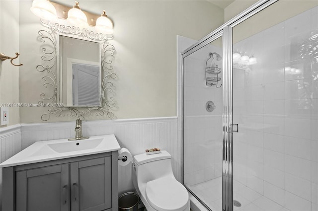8205 SW 171st Ter, Palmetto Bay, FL 33157 - full bathroom with vanity, a wainscoted wall, and a shower stall