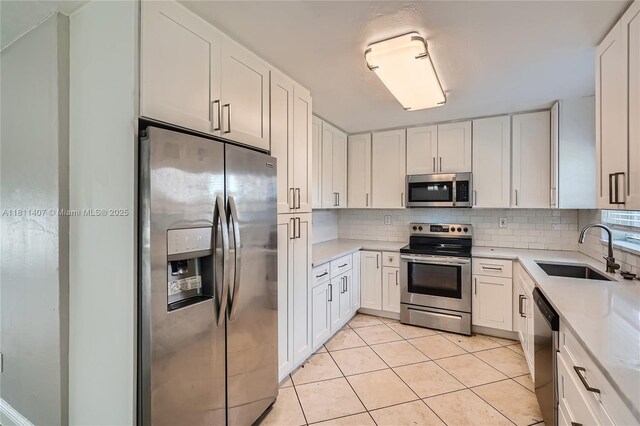 20701 Eagle Nest Rd, Cutler Bay, FL 33189 - unfurnished room featuring light tile patterned floors and baseboards