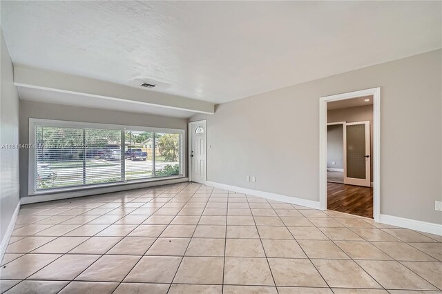 20701 Eagle Nest Rd, Cutler Bay, FL 33189 - unfurnished room featuring light tile patterned flooring and baseboards