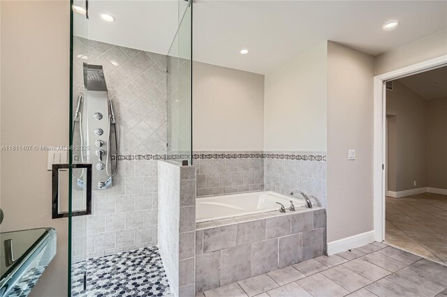 20701 Eagle Nest Rd, Cutler Bay, FL 33189 - full bath featuring a garden tub, a shower stall, tile patterned flooring, and recessed lighting