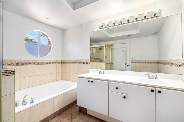 21024 NE 34th Ct, Aventura, FL 33180 - bathroom featuring a garden tub, a shower stall, double vanity, and tile patterned floors