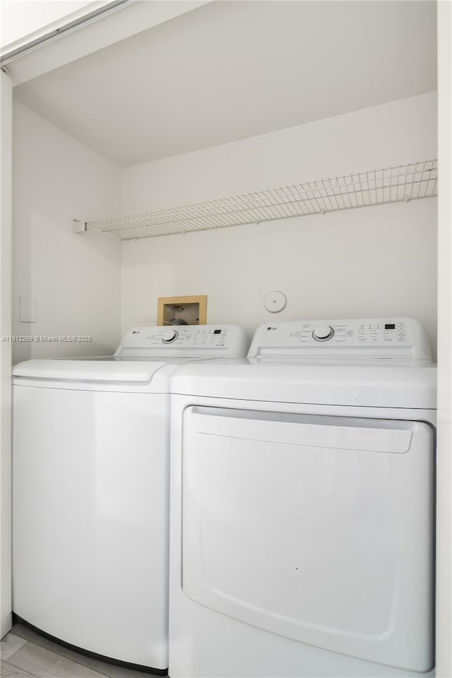 21024 NE 34th Ct, Aventura, FL 33180 - laundry area featuring independent washer and dryer