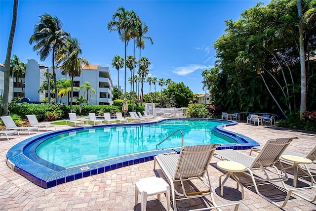 21024 NE 34th Ct, Aventura, FL 33180 - community pool with a patio area