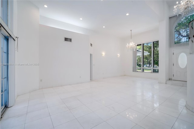 7201 SW 84th Pl, Miami, FL 33143 - unfurnished room featuring a chandelier, light tile patterned flooring, recessed lighting, and a towering ceiling