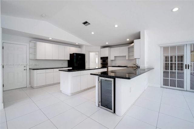 7201 SW 84th Pl, Miami, FL 33143 - kitchen featuring open shelves, beverage cooler, vaulted ceiling, fridge, and a peninsula