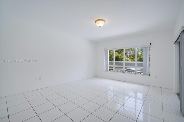 7201 SW 84th Pl, Miami, FL 33143 - unfurnished room featuring light tile patterned flooring