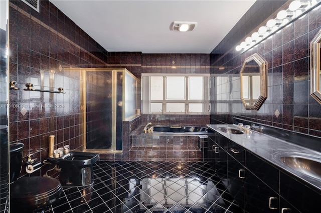 7201 SW 84th Pl, Miami, FL 33143 - full bath with a garden tub, tile walls, a stall shower, double vanity, and a bidet