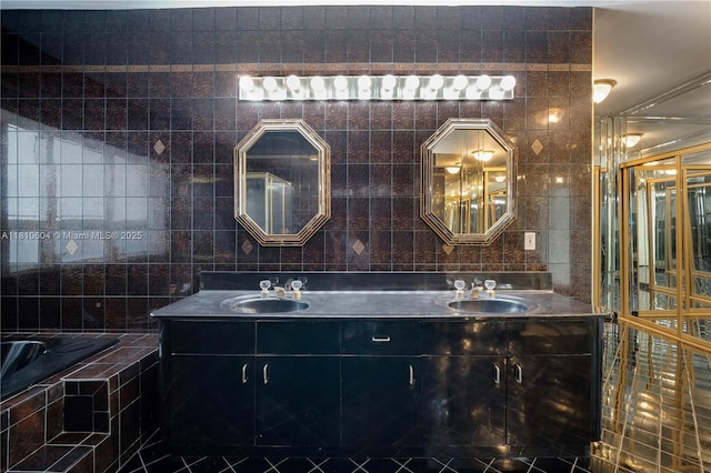 7201 SW 84th Pl, Miami, FL 33143 - full bath featuring tile walls, double vanity, and a relaxing tiled tub