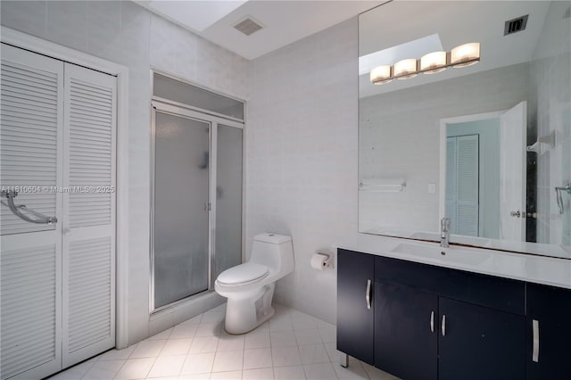 7201 SW 84th Pl, Miami, FL 33143 - bathroom featuring vanity, toilet, a shower stall, and tile patterned flooring