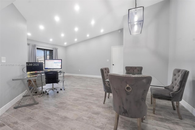 469 NE 207th Ln Unit 205, Miami, FL 33179 - dining room featuring baseboards, a desk, recessed lighting, and wood finished floors