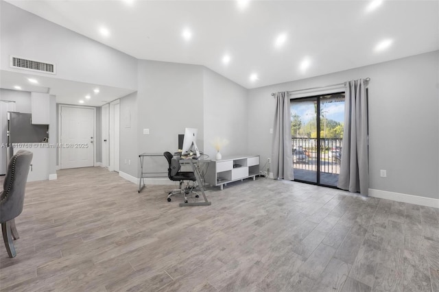 469 NE 207th Ln Unit 205, Miami, FL 33179 - office space with vaulted ceiling, light wood finished floors, baseboards, and recessed lighting