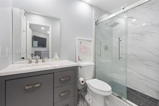 469 NE 207th Ln Unit 205, Miami, FL 33179 - full bathroom with a marble finish shower, vanity, and toilet
