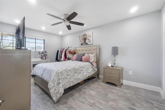 469 NE 207th Ln Unit 205, Miami, FL 33179 - bedroom featuring wood finished floors, baseboards, recessed lighting, and a ceiling fan