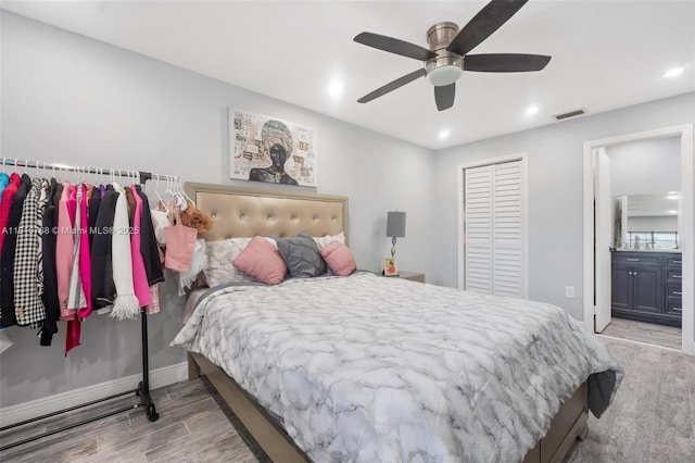 469 NE 207th Ln Unit 205, Miami, FL 33179 - bedroom with wood finished floors, recessed lighting, baseboards, ensuite bath, and a closet